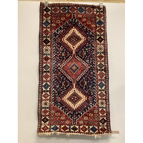 47 - A Caucasian style blue ground rug, 146 x 78cm