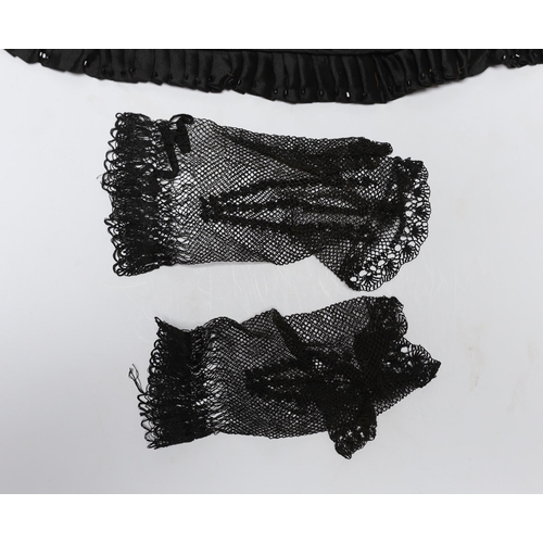 474 - Two 19th century silk baby gowns, a ladies lace trimmed bonnet, a black satin and lace maids apron, ... 