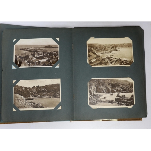 476 - A postcard album and various early 20th century postcards, of various views of UK towns, etc.