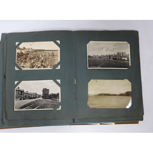 476 - A postcard album and various early 20th century postcards, of various views of UK towns, etc.