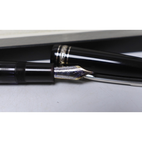 478 - A Montblanc boxed Meistertuck fountain pen and a leather cased Montblanc ballpoint pen, a spare bo... 