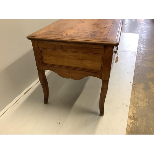 56 - A late 18th century French Provincial fruitwood kneehole table, width 178cm, depth 70cm, height 74cm... 