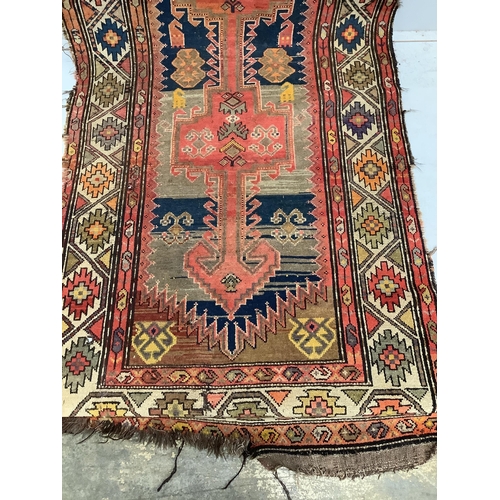 57 - An antique Afghan runner, 350 x 104cm