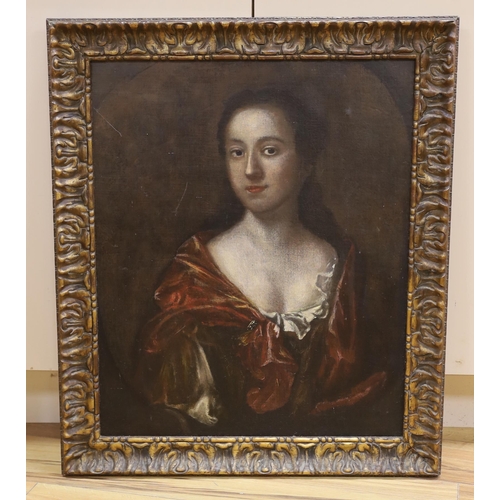 676 - 18th century English School, oil on canvas, Portrait of a lady, feigned oval, 63 x 52cm