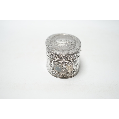 829 - An Edwardian Hanau silver oval box, with hinged cover and foliate and swag decoration, import marks ... 