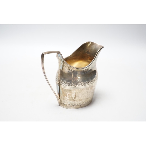 832 - A George III silver engraved helmet shaped cream jug, Godbehere & Wigan, London, 1796, 10cm, 5.3oz.... 