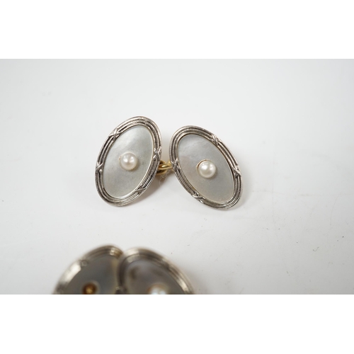 900 - A pair of Edwardian 15ct, mother of pearl and seed pearl set oval cufflinks, 17mm, gross weight 7.3 ... 