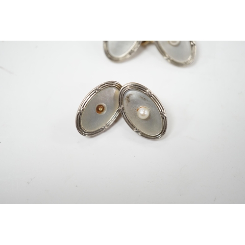 900 - A pair of Edwardian 15ct, mother of pearl and seed pearl set oval cufflinks, 17mm, gross weight 7.3 ... 