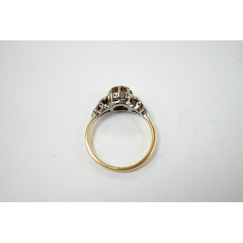 902 - A yellow metal and illusion set solitaire diamond ring, size O, gross weight 3.8 grams.