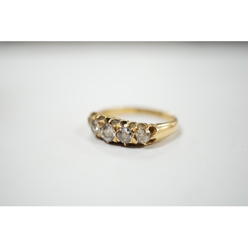 903 - A late Victorian 18ct gold and graduated five stone diamond set half hoop ring, size L/M, gross weig... 