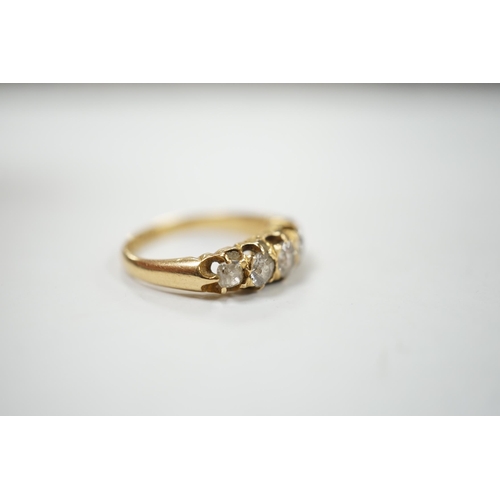 903 - A late Victorian 18ct gold and graduated five stone diamond set half hoop ring, size L/M, gross weig... 