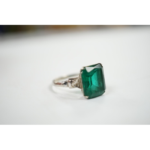 914 - A 14k and single stone green paste set ring, with diamond chip set shoulders, size P, gross weight 3... 