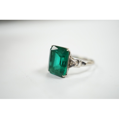 914 - A 14k and single stone green paste set ring, with diamond chip set shoulders, size P, gross weight 3... 