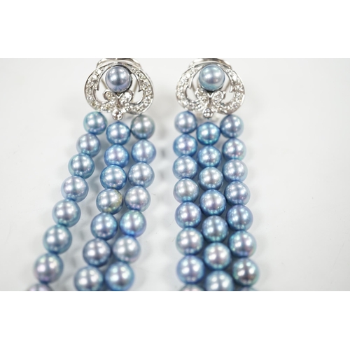 917 - A modern pair of white metal, diamond chip cluster and bluey/grey three row cultured pearl tassel dr... 