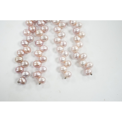 918 - A modern pair of white metal, diamond chip cluster and three row pink cultured pearl tassel drop ear... 