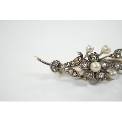 922 - A cased Victorian yellow metal, seed pearl and rose cut diamond set foliate spray brooch, 39mm, gros... 