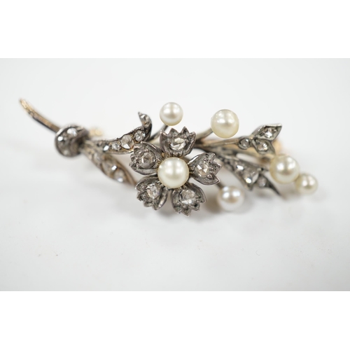 922 - A cased Victorian yellow metal, seed pearl and rose cut diamond set foliate spray brooch, 39mm, gros... 