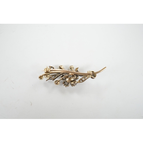 922 - A cased Victorian yellow metal, seed pearl and rose cut diamond set foliate spray brooch, 39mm, gros... 