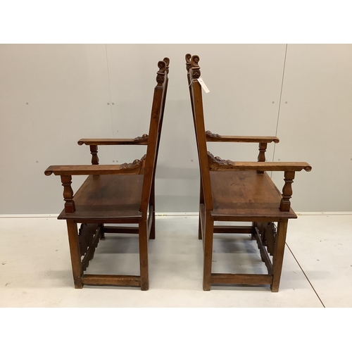 93 - A pair of 18th century style carved inlaid walnut elbow chairs, width 57cm, depth 49cm, height 124cm... 