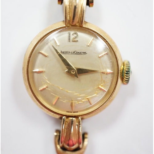 940 - A lady's 9ct gold Jaeger LeCoultre manual wind wrist watch, on an associated 9ct gold bracelet, over... 