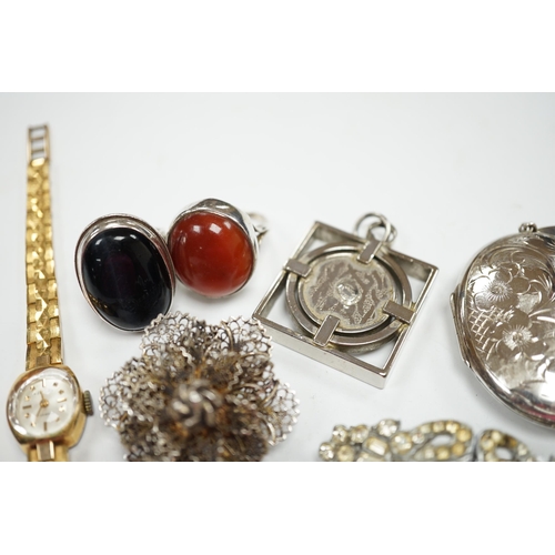 946 - A silver and cabochon set dress ring, mixed costume jewellery and a lady's wrist watch.