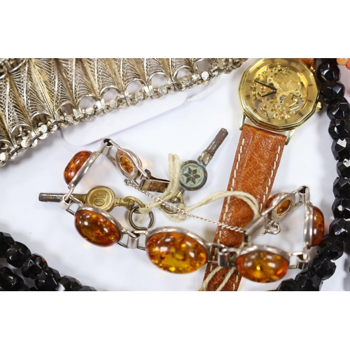 952 - A continental 835 filigree white metal bracelet, a 925 and amber bracelet and other items including ... 