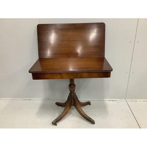 115 - A reproduction Regency style mahogany folding tea table, width 85cm, depth 42cm, height 76cm