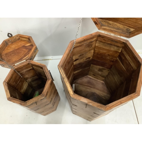 100 - Two Indian metal mounted octagonal hardwood boxes, larger width 45cm, height 77cm