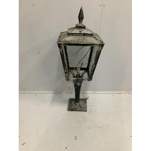 107 - A square metal lantern, height 90cm