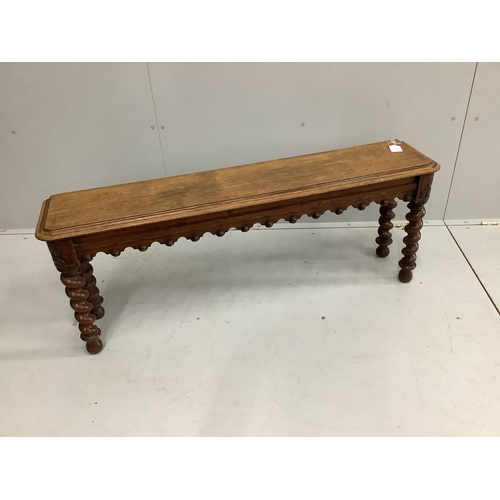 108 - A Victorian oak window seat on spiral turned legs, width 122cm, depth 25cm, height 47cm