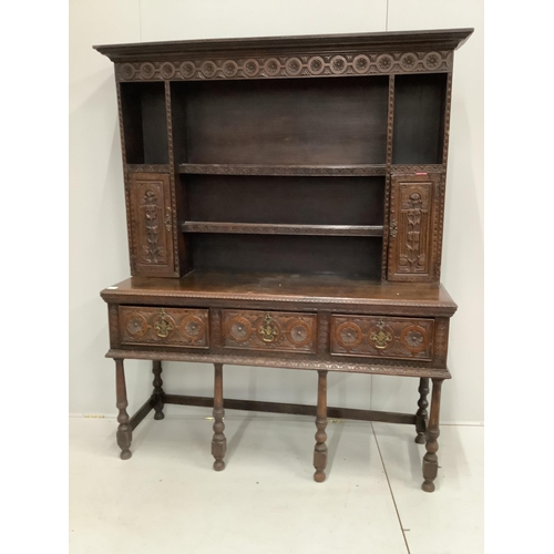 113 - An 18th century style carved oak dresser, width 151cm, depth 49cm, height 191cm