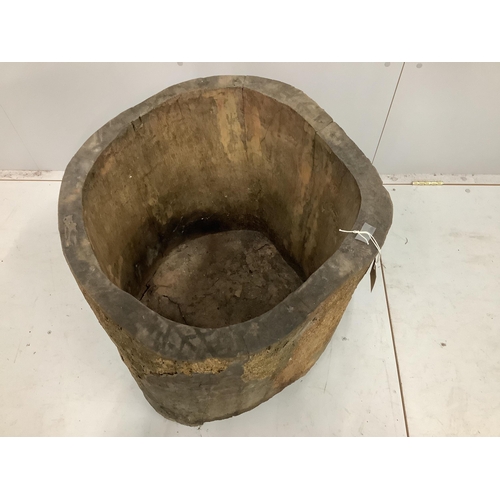 12 - A Provincial circular wooden mortar, diameter 50cm, height 71cm