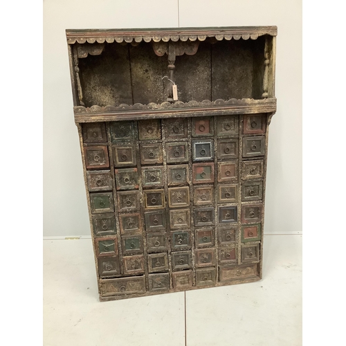 123 - An Indian painted hardwood bank of drawers (af), width 96cm, depth 31cm, height 141cm