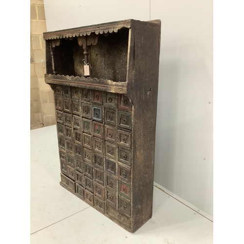 123 - An Indian painted hardwood bank of drawers (af), width 96cm, depth 31cm, height 141cm