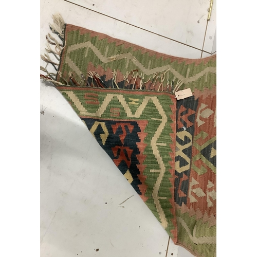 135 - A Kilim polychrome flatweave runner, 280 x 78cm