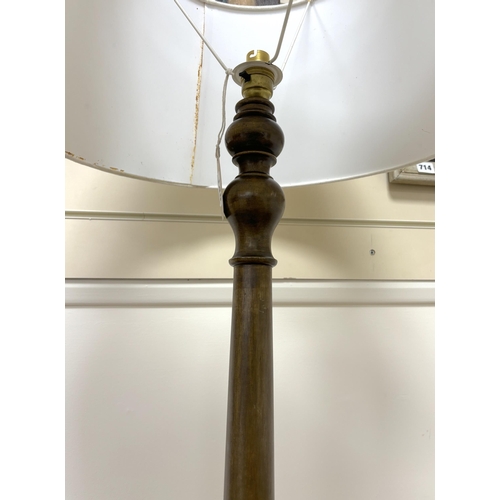 140 - A mahogany standard lamp with shade, height including shade 170cm