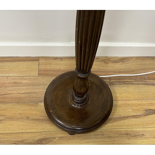 140 - A mahogany standard lamp with shade, height including shade 170cm