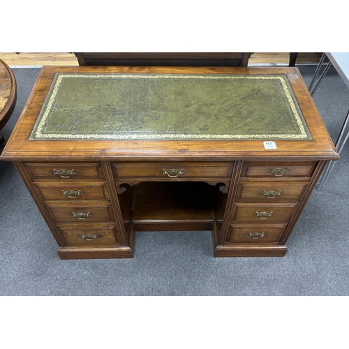 157 - A late Victorian walnut kneehole desk, width 114cm, depth 56cm, height 76cm