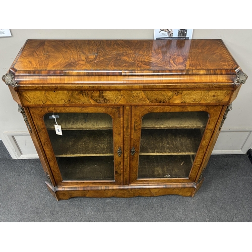 160 - A mid Victorian tulip banded and gilt metal mounted figured walnut two door glazed side cabinet, wid... 