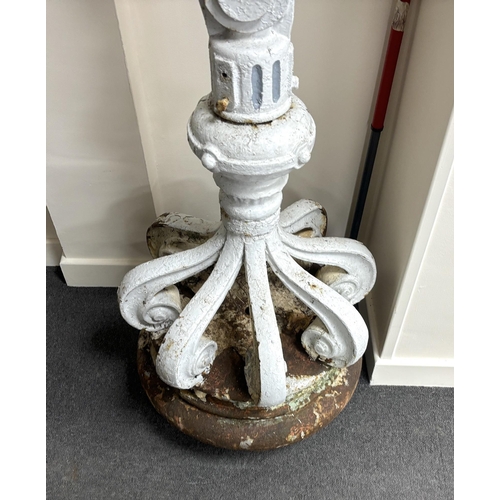 162 - A late 19th/early 20th century cast iron promenade lamp, height 224cm.