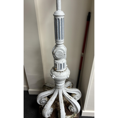 162 - A late 19th/early 20th century cast iron promenade lamp, height 224cm.