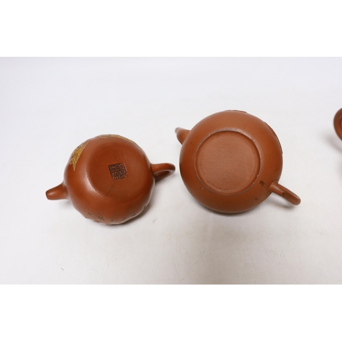 263 - Four Chinese Yixing teapots, one slip decorated with a landscape, tallest 10.5cm Provenance- from a ... 