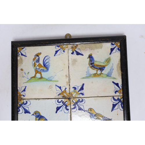 281 - A 17th century Delft four-tile panel, polychrome-decorated with birds and with fleur-de-lys to corne... 