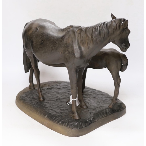 282 - A 1970's Russian cast iron horse group of mare and foal, 35cm wide