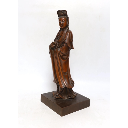 293 - A Chinese carved boxwood figure of Guanyin, 19th century, 37cm high