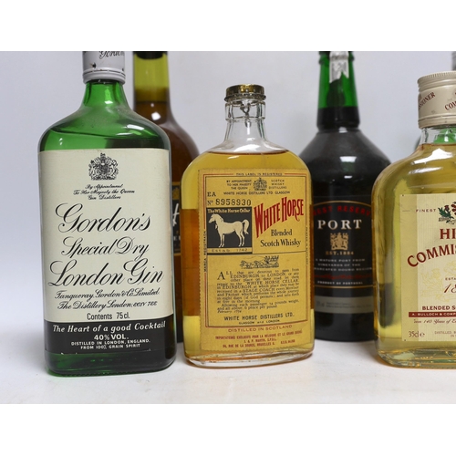 318 - Two 75cl bottles of Gordons gin, two 35cl bottles of whisky, a bottle of sherry and a bottle of port... 