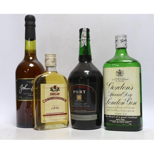 318 - Two 75cl bottles of Gordons gin, two 35cl bottles of whisky, a bottle of sherry and a bottle of port... 