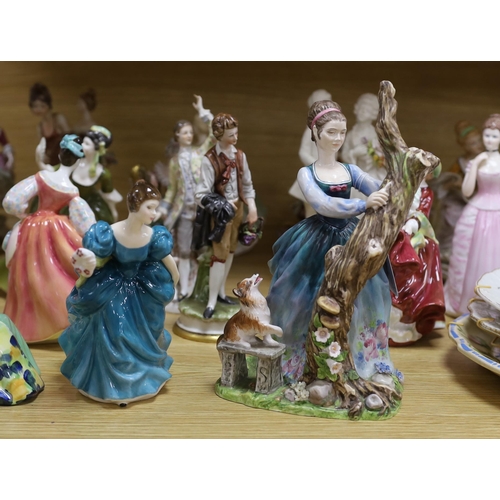 323 - A collection of various porcelain figures including Coalport, Doulton etc. and two dessert plates... 