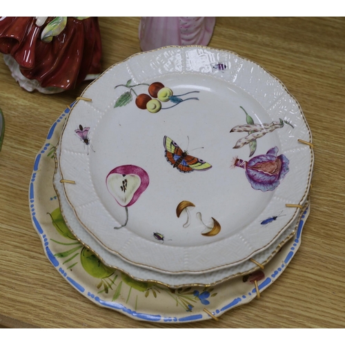 323 - A collection of various porcelain figures including Coalport, Doulton etc. and two dessert plates... 