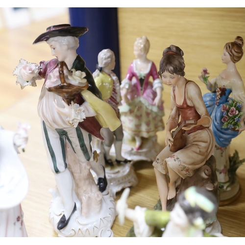 323 - A collection of various porcelain figures including Coalport, Doulton etc. and two dessert plates... 